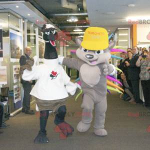 2 mascots: a black and white ostrich and a colorful hedgehog -