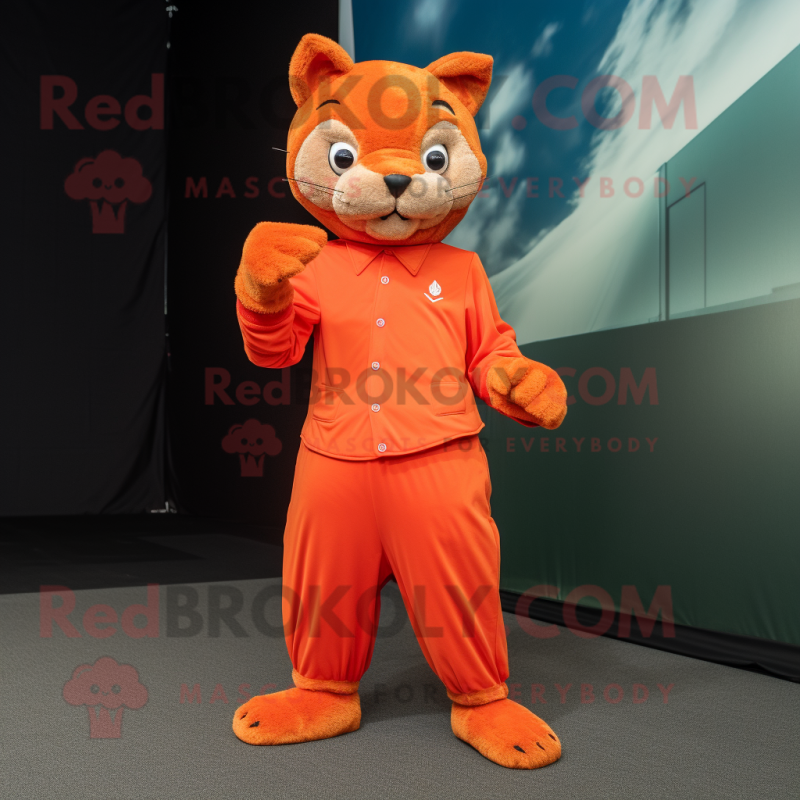 Orange Jaguarundi mascot costume character dressed with a Culottes and Foot pads