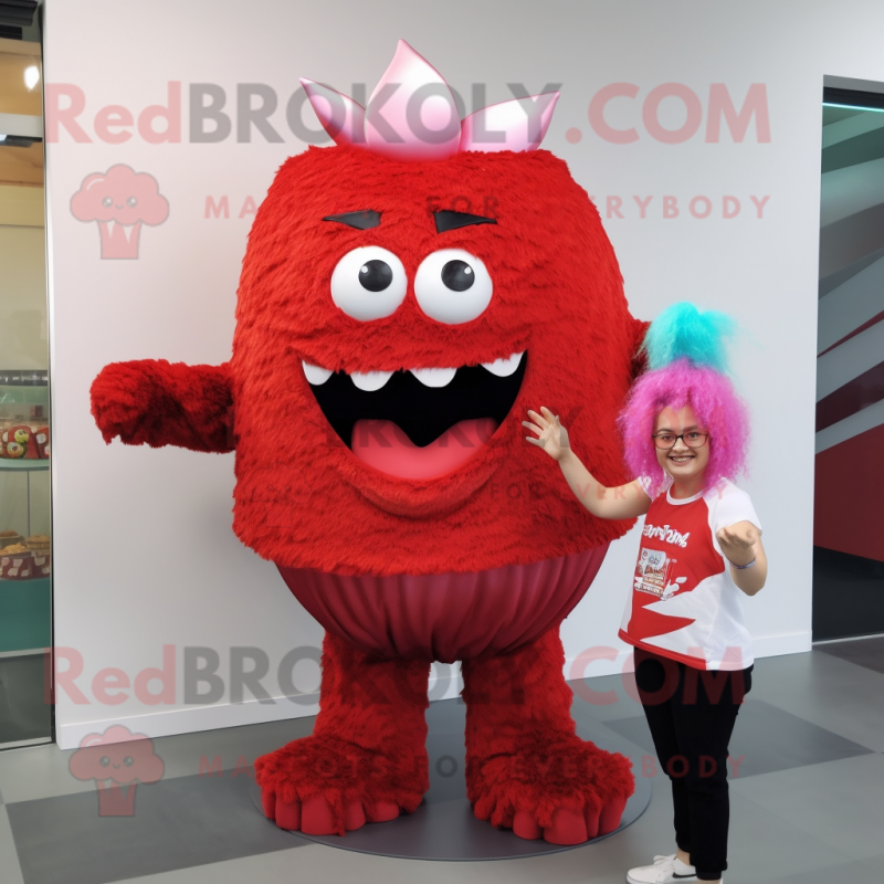 Red Cupcake mascot costume character dressed with a Tank Top and Hair clips