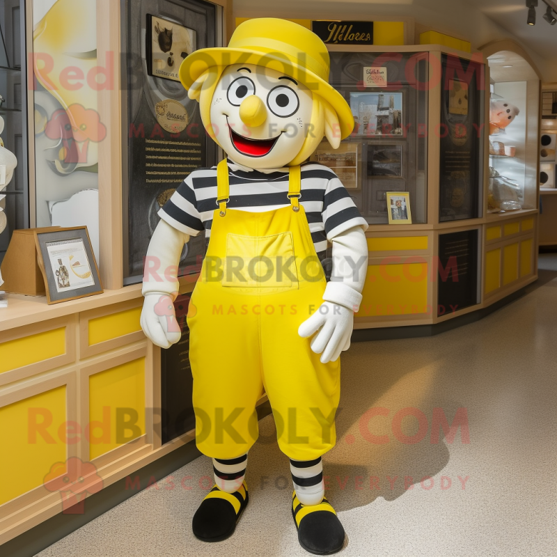 Lemon Yellow Mime mascot costume character dressed with a Overalls and Backpacks