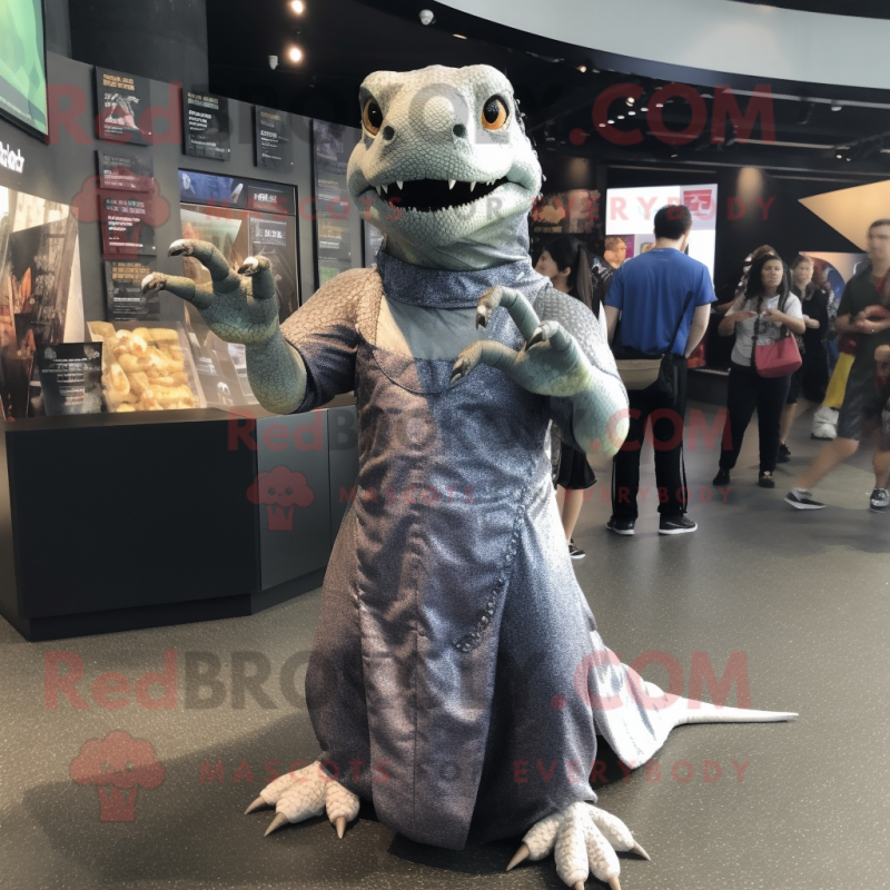 Silver Komodo Dragon mascot costume character dressed with a Ball Gown and Messenger bags