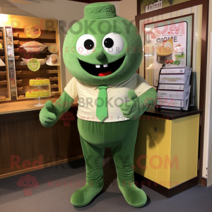 Olive Cupcake mascot costume character dressed with a Henley Tee and Tie pins