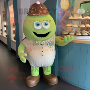 Olive Cupcake mascot costume character dressed with a Henley Tee and Tie pins