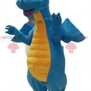 Mascotte de dragon bleu et jaune très souriant. Costume de