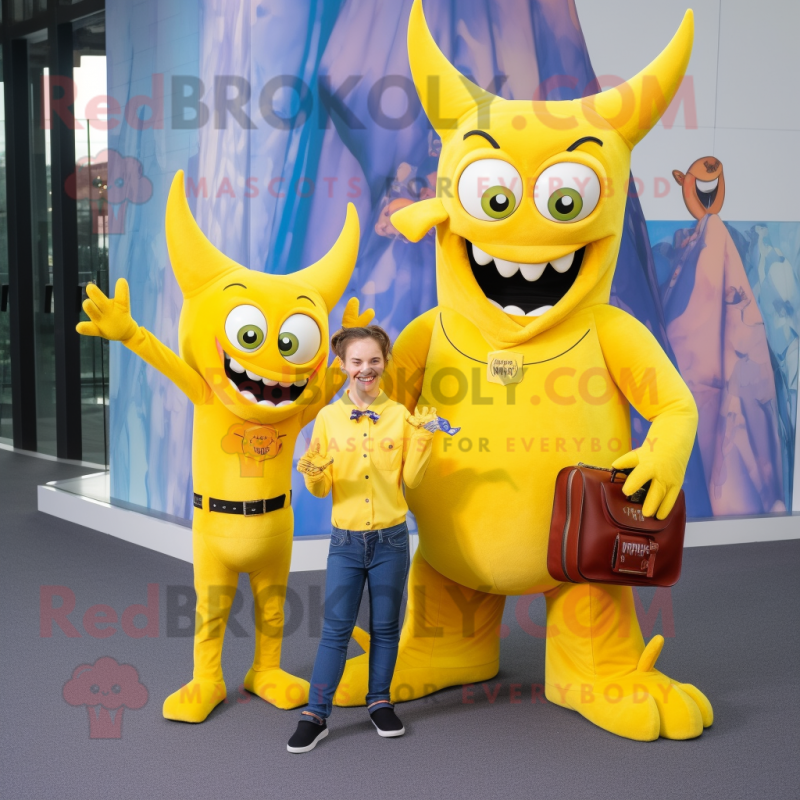 Yellow Devil mascot costume character dressed with a Mom Jeans and Wallets Yellow Devil mascot costume character dressed with a Mom Jeans and Wallets