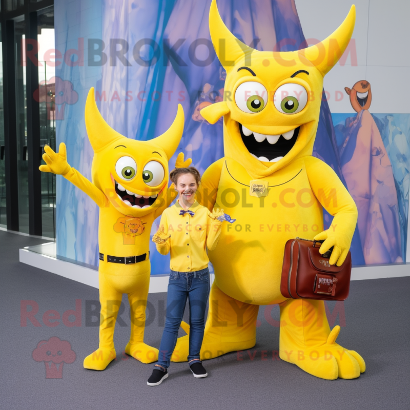 Yellow Devil mascot costume character dressed with a Mom Jeans and Wallets