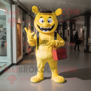 Yellow Devil mascot costume character dressed with a Mom Jeans and Wallets