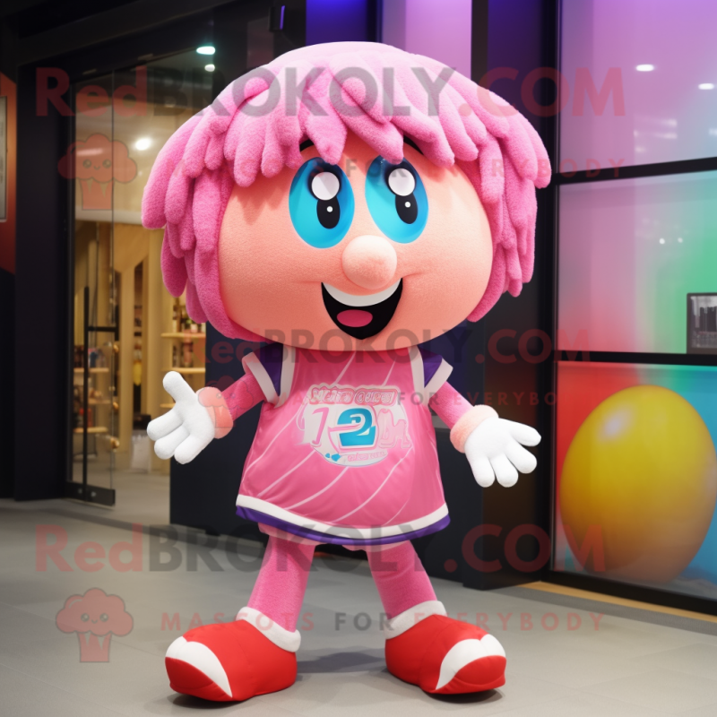 Pink Candy mascot costume character dressed with a Shorts and Headbands