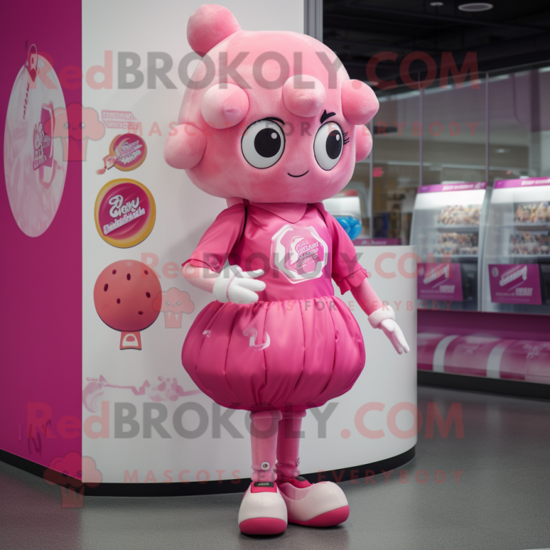 Pink Candy mascot costume character dressed with a Shorts and Headbands