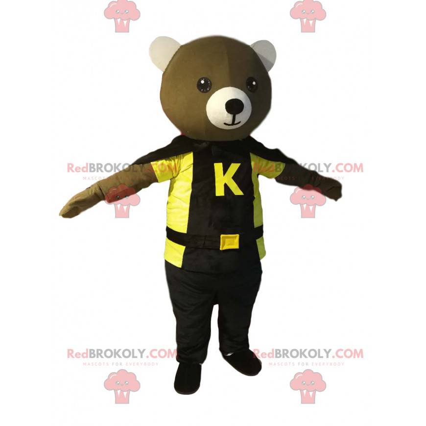 Mascote do urso com capa preta e camiseta amarela -