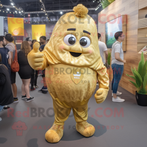 Gold Potato mascot costume character dressed with a V-Neck Tee and Brooches