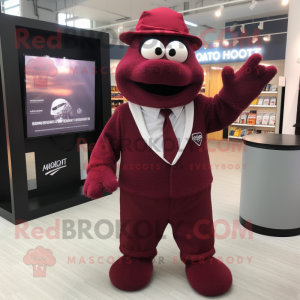 Maroon Aglet mascot costume character dressed with a Cardigan and Cufflinks