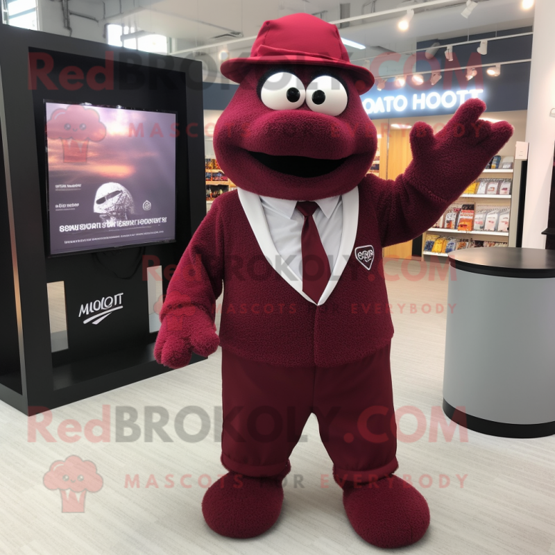 Maroon Aglet mascot costume character dressed with a Cardigan and Cufflinks