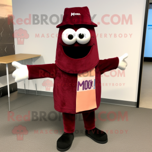 Maroon Aglet mascot costume character dressed with a Cardigan and Cufflinks