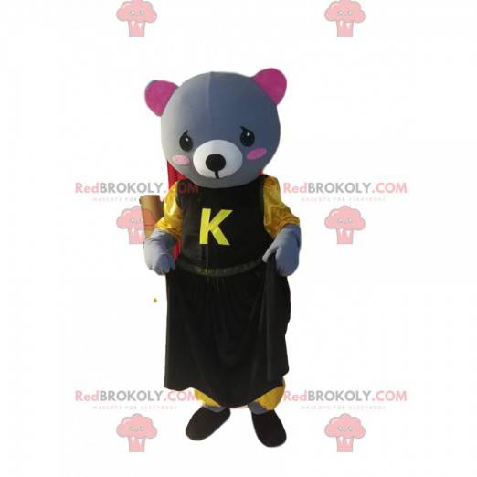 Mascot ousonne grigio con un vestito giallo e nero. -