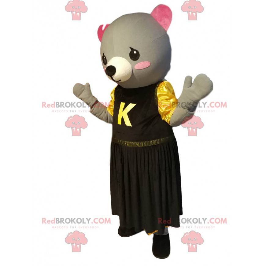Mascote cinza ousonne com um vestido amarelo e preto. - Mascote cinza ousonne com um vestido amarelo e preto. -