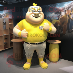 Lemon Yellow Strongman mascot costume character dressed with a Henley Tee and Lapel pins