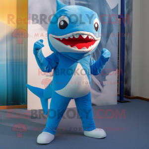 Blue Shark mascot costume character dressed with a Capri Pants and Foot pads