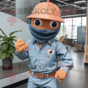 Peach Ninja mascot costume character dressed with a Chambray Shirt and Hat pins