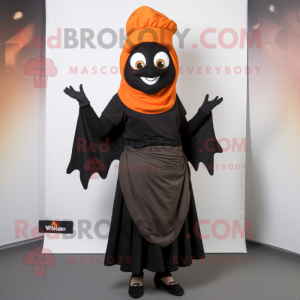 Black Tikka Masala mascot costume character dressed with a Culottes and Scarf clips