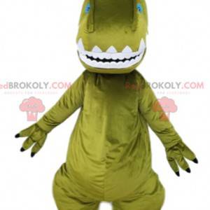 Green dinosaur mascot and its orange crest. - Redbrokoly.com