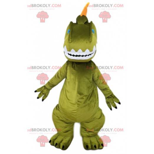 Grön dinosaurmaskot och dess orange topp. - Redbrokoly.com