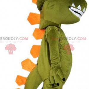 Mascote do dinossauro verde e sua crista laranja. -