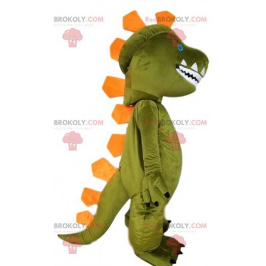 Mascote do dinossauro verde e sua crista laranja. -