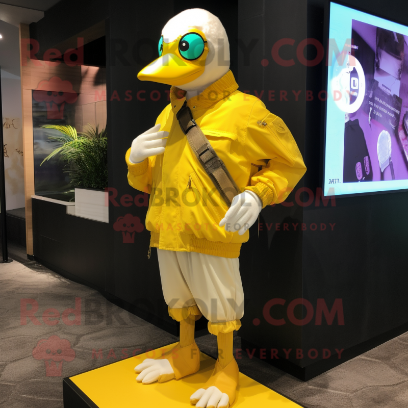 Yellow Albatross mascot costume character dressed with a Windbreaker and Digital watches