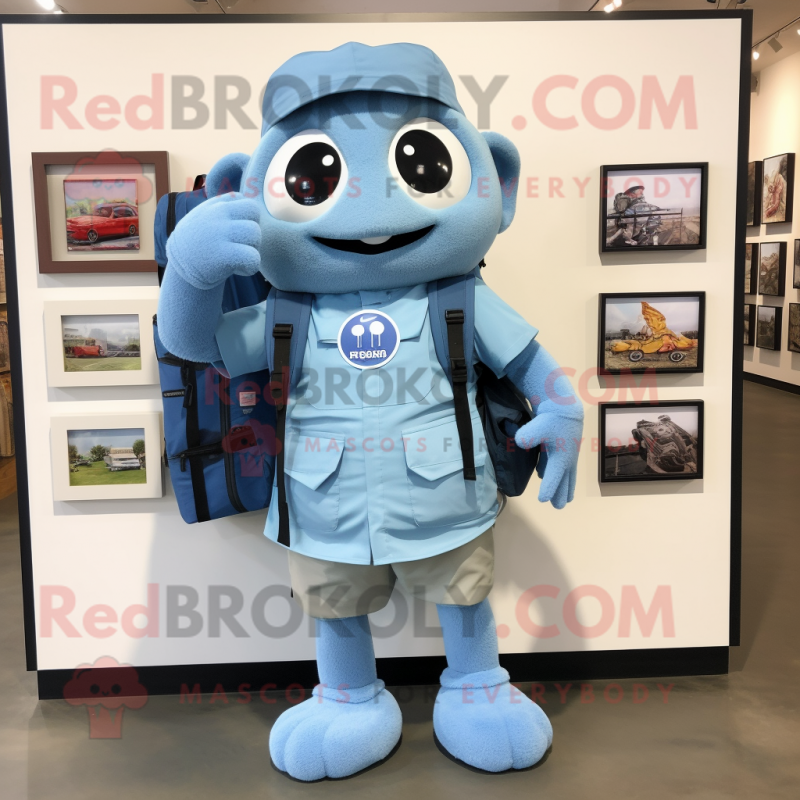 Sky Blue Camera mascot costume character dressed with a Oxford Shirt and Backpacks