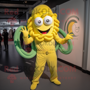 Lemon Yellow Medusa mascot costume character dressed with a Jumpsuit and Caps
