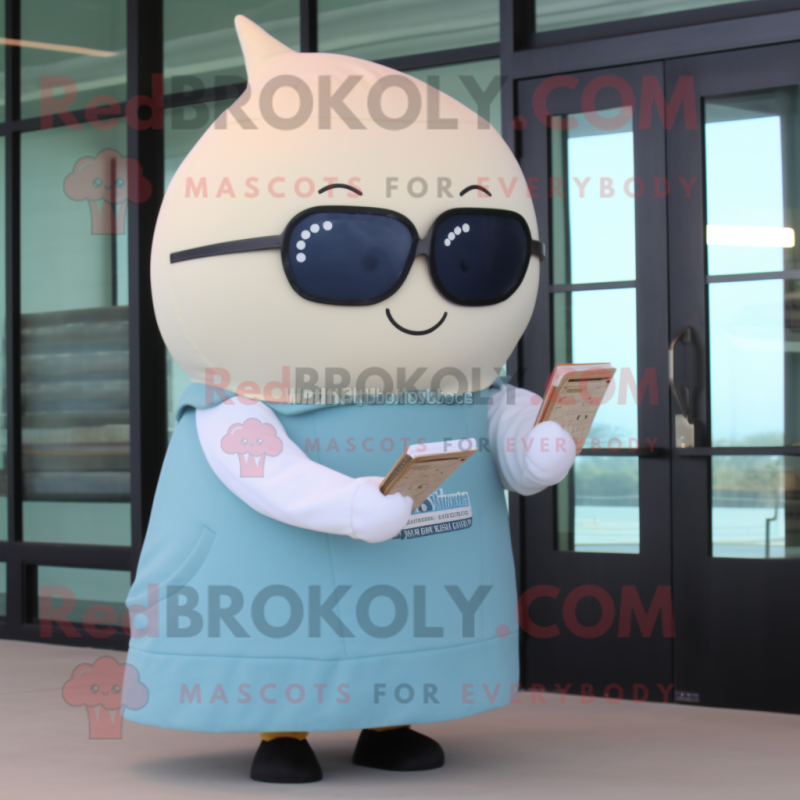 Cream Narwhal mascot costume character dressed with a Long Sleeve Tee and Reading glasses Cream Narwhal mascot costume character dressed with a Long Sleeve Tee and Reading glasses