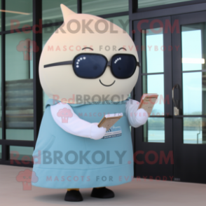 Cream Narwhal mascot costume character dressed with a Long Sleeve Tee and Reading glasses