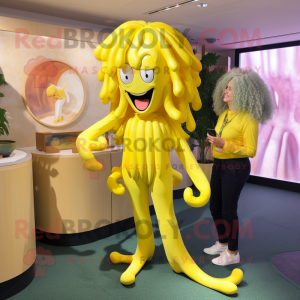 Yellow Medusa mascot costume character dressed with a Capri Pants and Cufflinks
