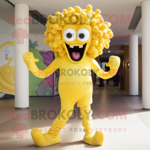 Yellow Medusa mascot costume character dressed with a Capri Pants and Cufflinks