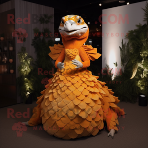 Orange Pangolin mascot costume character dressed with a Evening Gown and Suspenders