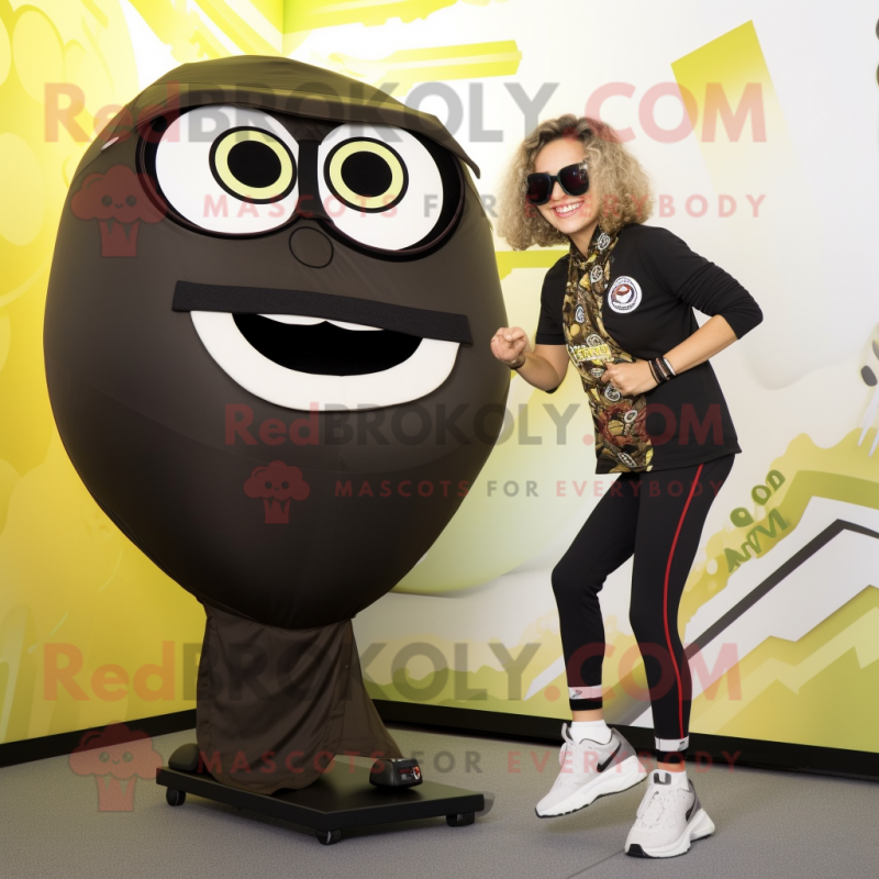 Olive Fried Calamari mascot costume character dressed with a Yoga Pants and Sunglasses