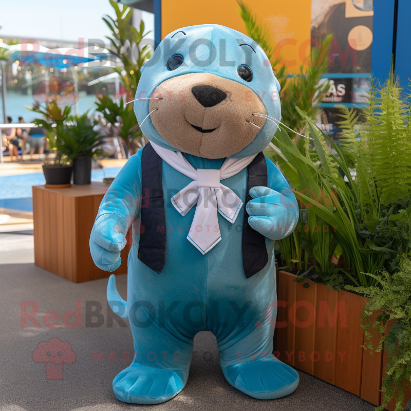 Cyan Sea Lion mascot costume character dressed with a Dungarees and Bow ties Cyan Sea Lion mascot costume character dressed with a Dungarees and Bow ties