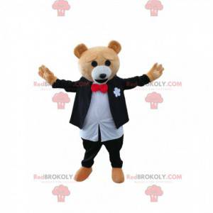 Mascotte d'ours brun en costume noir et blanc. Costume d'ours -