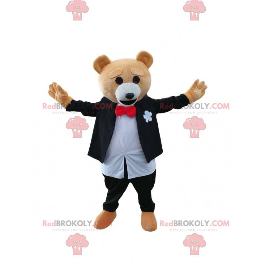 Mascote do urso pardo em traje preto e branco. Fantasia de urso Mascote do urso pardo em traje preto e branco. Fantasia de urso