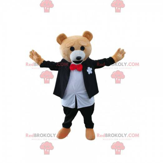 Mascote do urso pardo em traje preto e branco. Fantasia de urso