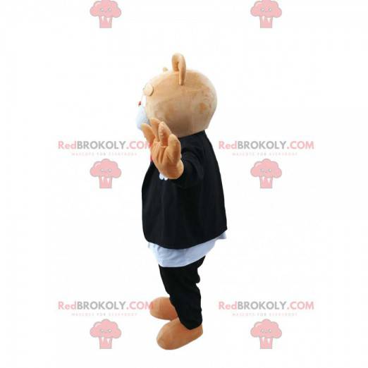 Mascotte d'ours brun en costume noir et blanc. Costume d'ours -