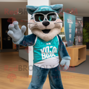 Teal Bobcat mascot costume character dressed with a Board Shorts and Headbands