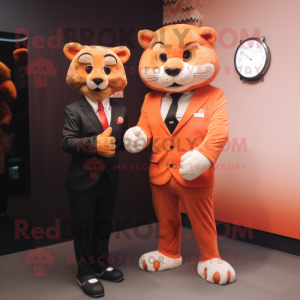 Peach Panther mascot costume character dressed with a Suit Jacket and Smartwatches