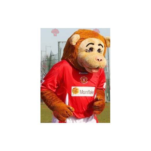 Beige und orange Affenmaskottchen in Sportbekleidung -