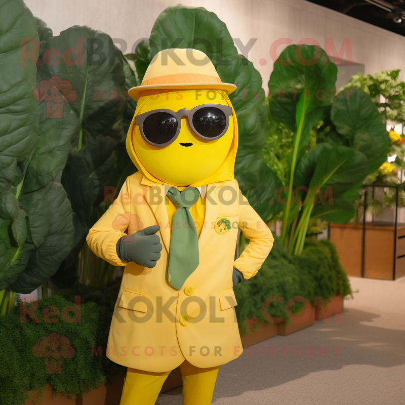 Yellow Spinach mascot costume character dressed with a Suit and Sunglasses