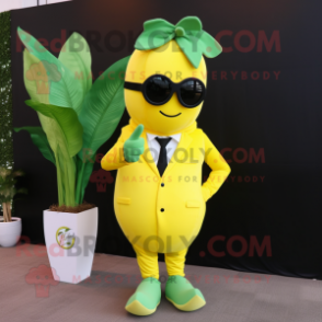 Yellow Spinach mascot costume character dressed with a Suit and Sunglasses