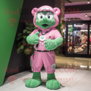 Pink Four Leaf Clover mascot costume character dressed with a Board Shorts and Bracelet watches