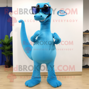 Blue Diplodocus mascot costume character dressed with a Bootcut Jeans and Eyeglasses