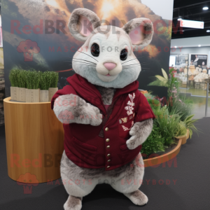 Maroon Chinchilla mascot costume character dressed with a Cardigan and Rings